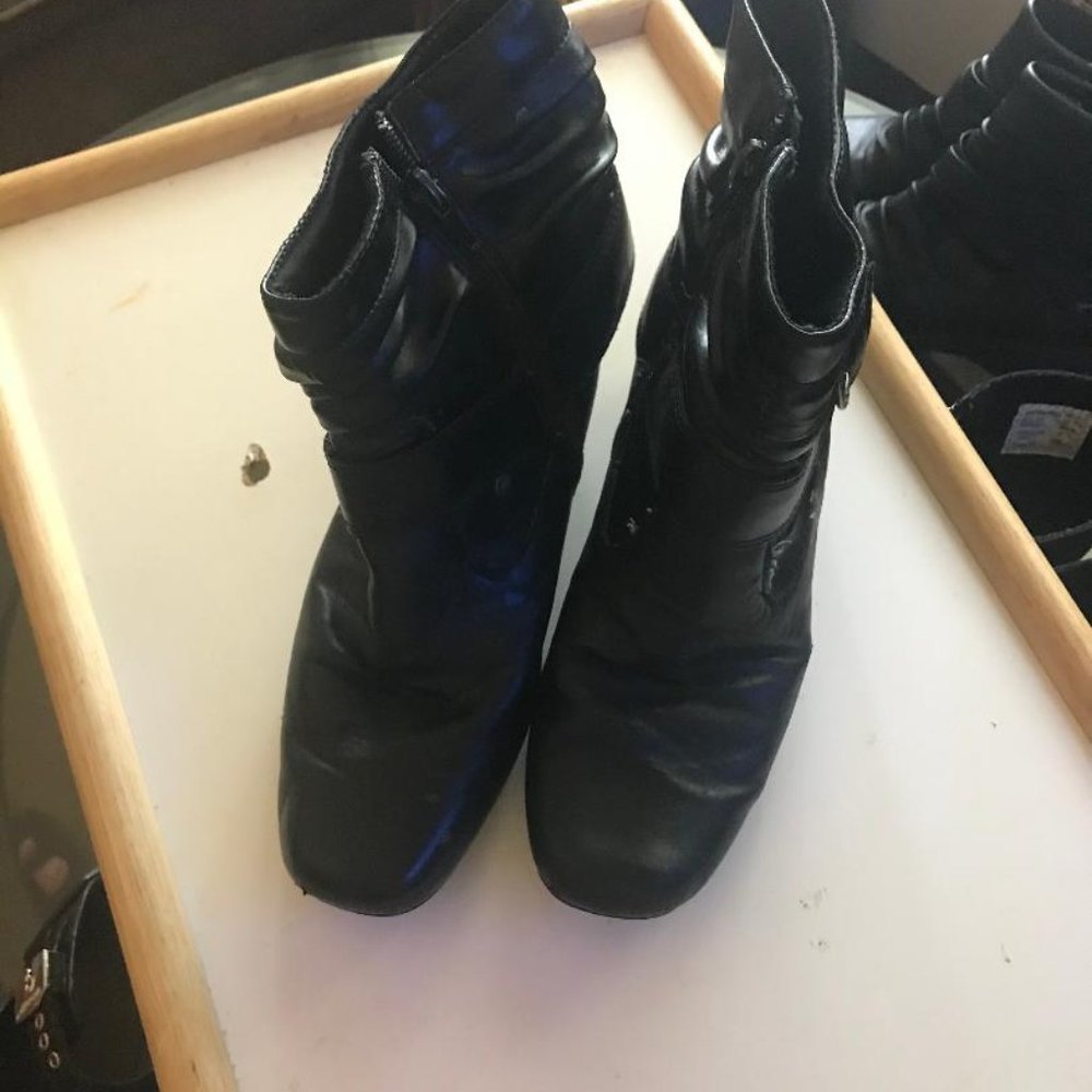 Pair of Black leather boots.